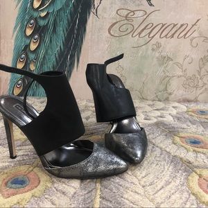 Silver and black heels